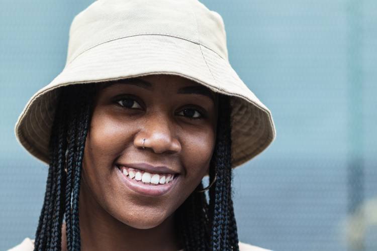 young-black-woman-in-hat-2025-04-04-05-06-04-utc.jpg